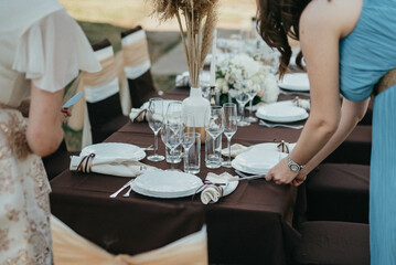Wedding. Birthday. Reception. Decoration, chairs, tables and flowers.