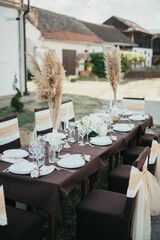 Wedding. Birthday. Reception. Decoration, chairs, tables and flowers.