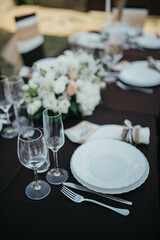 Wedding. Birthday. Reception. Decoration, chairs, tables and flowers.