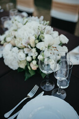 Wedding. Birthday. Reception. Decoration, chairs, tables and flowers.