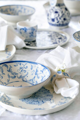 Easter table setting with empty craft ceramic tableware