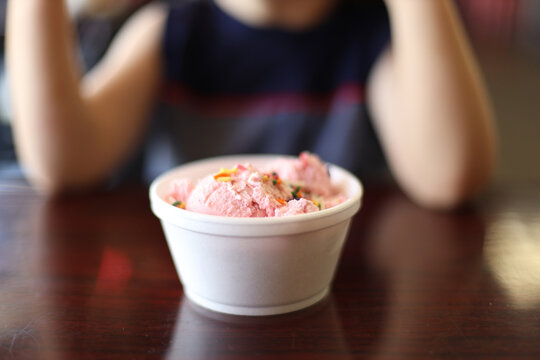 Boy eating Ice cream in a ice-cream shop in Orlando dflorida 