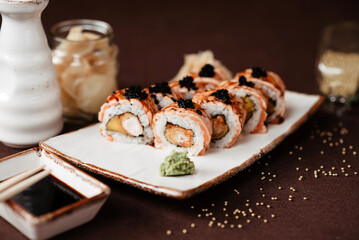 Close-up of sushi with eel and mango