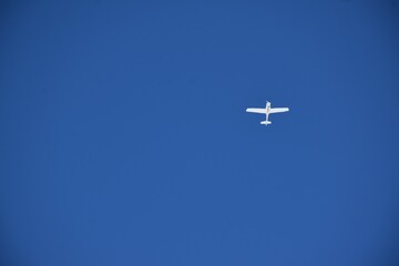 A plane in a blue sky, Québec, Canada