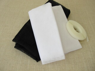 Insect screens for the window in white and anthracite and fixing tape
