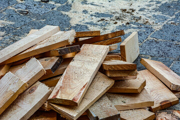 Pile of wood logs for build Furniture production,sew natural wood scraps, ready to recycle