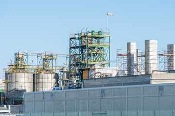 Factory producing materials and making pollution