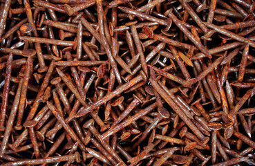 Rusty nail,Many rusted nail, Group of Iron rust, Metal surface becomes brown from deterioration.   ...