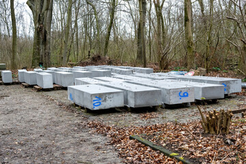 several concrete blocks in the forest