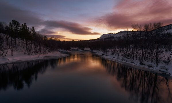  Dawn after the polar night on the banks of the Vaenga river. Kola peninsula.