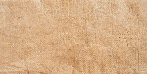 Close up of Recycled brown napkin wrinkled paper texture for background