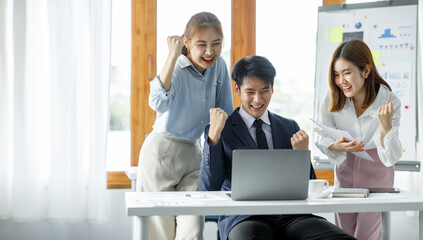 Group of Young Asian business team creative businesspeople coworker in office Happy to be successful partnership teamwork celebrating achievement and success concept. © David