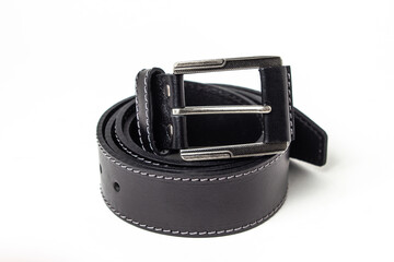 Black men's belt on a white background. Male accessory. Leather product