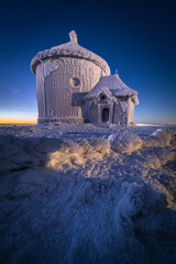 St. Lawrence Chapel on the top of Śnieżka in the Karkonosze Mountains. Winter view of the...