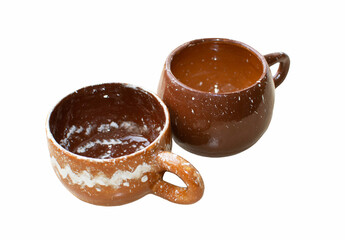 Handmade glazed clay mugs made according to the master class, handmade dishes
