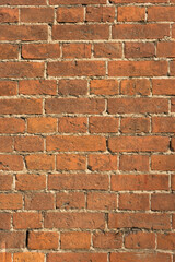 Old red brick wall texture. Background of a old brick house.