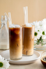 Iced coffee in glass. Cold refreshment iced coffee summer drink.