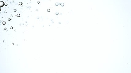 Moving Bubbles on Light Background, macro shot.