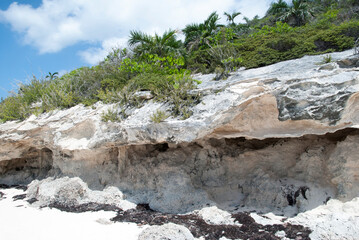 Fototapeta na wymiar Half Moon Cay Island Eroded Beach Rocks