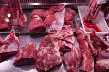 Meat products in a shop window in central market in Alicante