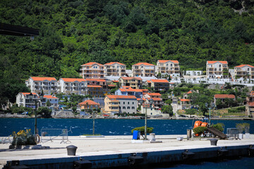 Fototapeta na wymiar Houses on the coast in the city of Kotor