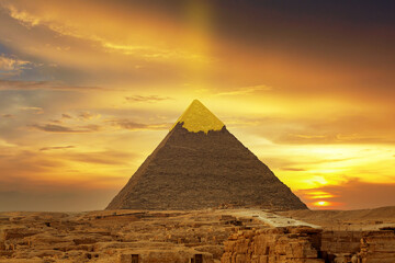Pyramid of Cheops in Giza Egypt with golden top - obrazy, fototapety, plakaty