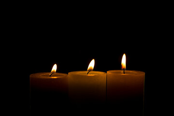 Warm candlelight on a dark mysterious background