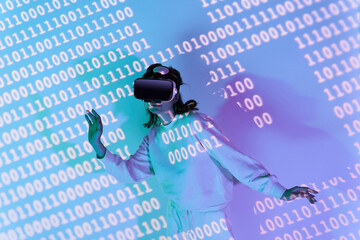 Woman in VR headset near wall with binary code