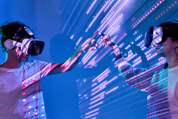 Couple exploring cyberspace under glowing lights