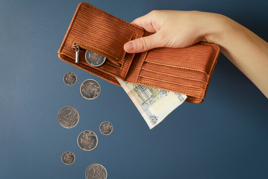 Russian rubles banknotes fall during the war in Ukraine. Inflation, sanctions and the fall of the Russian economy concept. Falling cash savings and budget