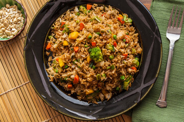 Fried Rice with Vegetables in Black Bowl