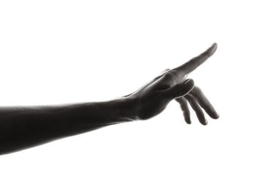 Silhouette of female hand showing something on white background