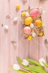 Easter pink, yellow and white eggs