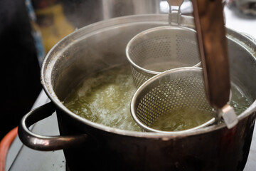 Boiling water on Pot