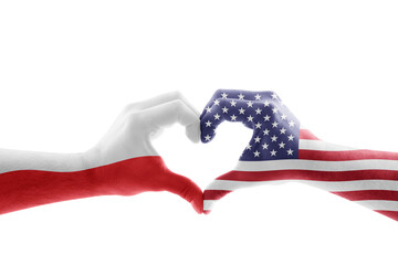 Two hands in the form of heart with Polish and United States flag isolated on white background with...