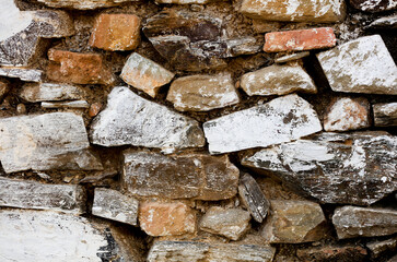 Stone wall texture. The stone wall as a background or texture. Part of a stone wall, for background or texture