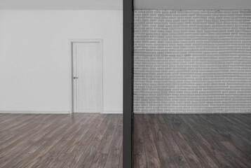 View of big empty room with door and folding screen