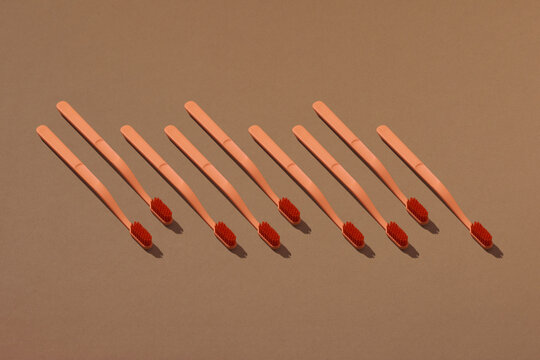 Set of tooth brushes on light background