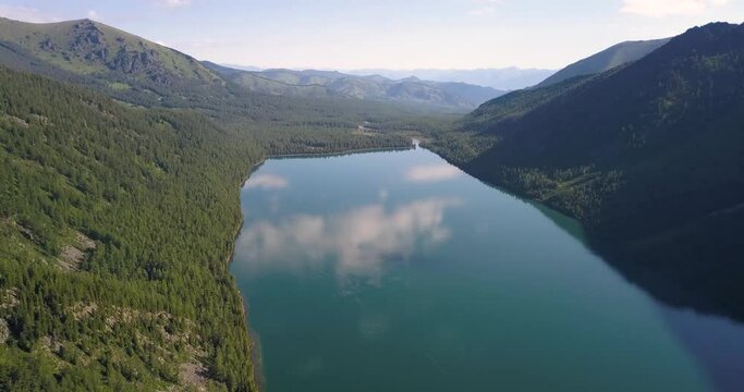 Panoramic aerial view of famous natural attraction of Altai and Russia - the Multa Lake. National park and outdoor recreation background