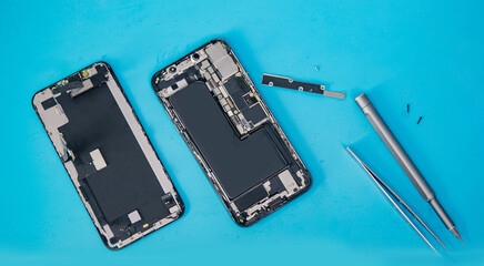 Repair modern mobile phone, master disassembles case to replace broken screen or replacement...