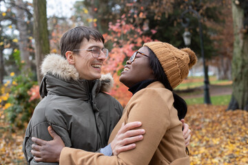 happy couple in love, smiling, rainy cold weather