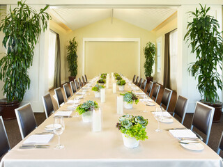 Long table at wedding reception meeting room at a hotel