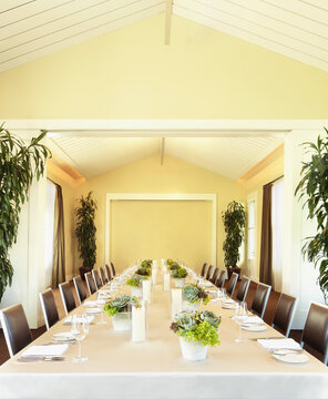 Long table event set up at wedding reception room