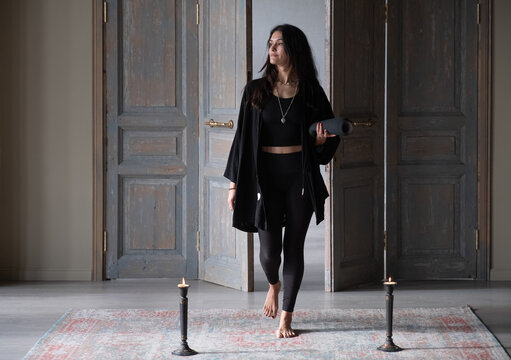 Female walking into meditation room