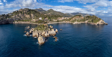 Aerial View. Panoramic drone image of the Gulf of Taormina and Isola Bella - Travel destination, Taormina, Sicily, Italy