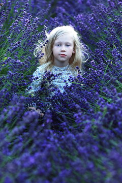 girl hiding on flower