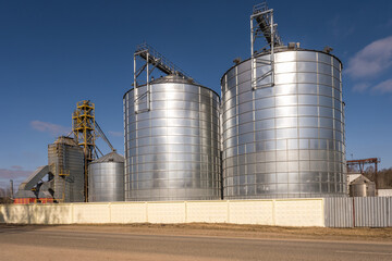 agro silos granary elevator on agro-processing manufacturing plant for processing drying cleaning and storage of agricultural products, flour, cereals and grain.