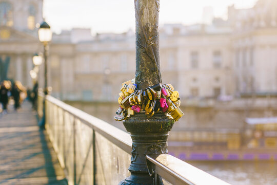 Column of city bridge with locks