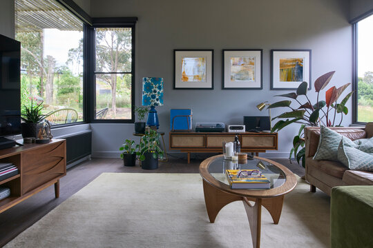 Modern interior with vintage mid century furniture