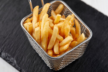 fried french fries in the basket